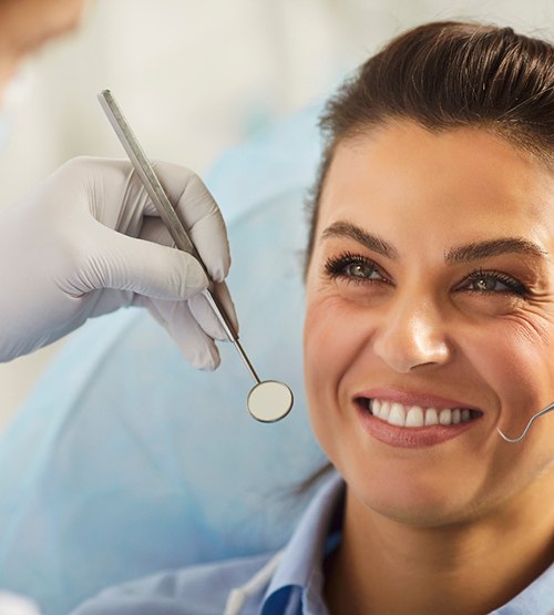 Gum recontouring permanently removes excess gum tissue