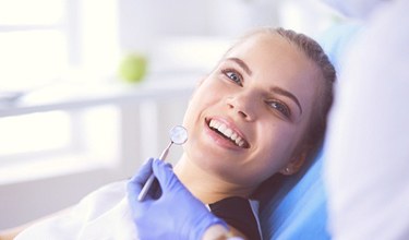Patient smiling at a dentist open on Saturday