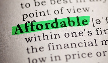 a dictionary with the word “affordable” highlighted in green