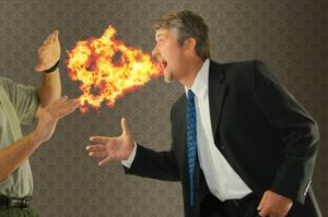 man has fire coming from mouth