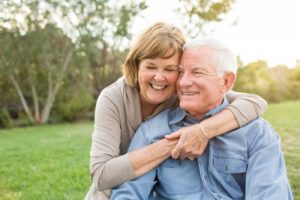 older couple hugging