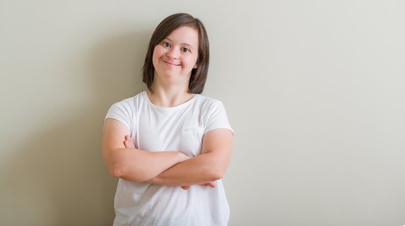 smiling person with Down syndrome