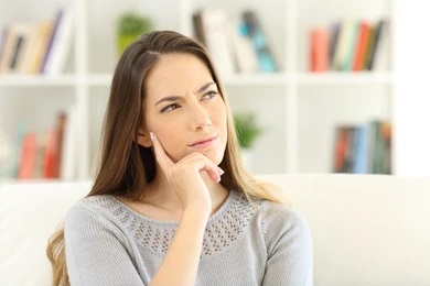 person wondering if everyone has wisdom teeth