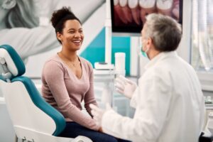 Woman talking with her dentist